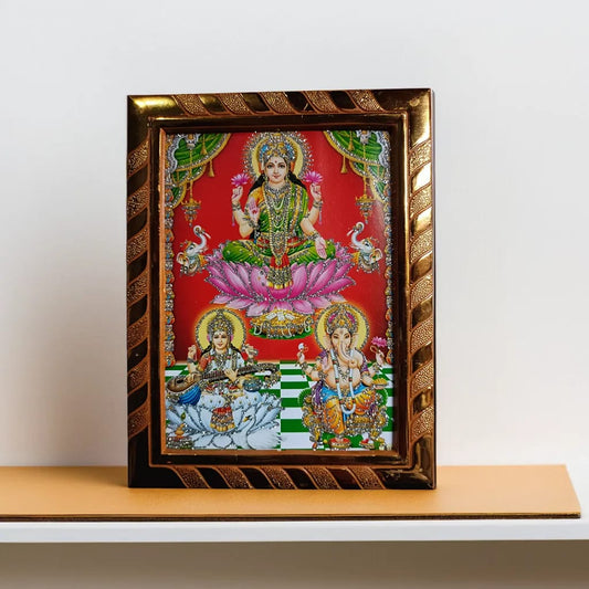 Decorative frame with a colorful depiction of deities on a red background